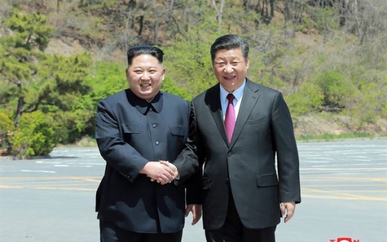 NK leader tries to maximize leverage in nuclear talks through China visit: experts