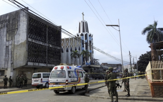 20 dead as bombs target Sunday Mass in Philippine cathedral