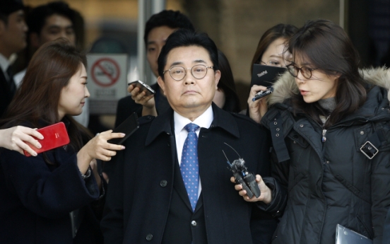 Ex-Moon aide handed 6-year jail term for graft, avoids being arrested