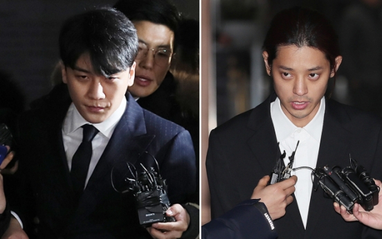 Seungri, Jung Joon-young return home after questioning over sex scandals