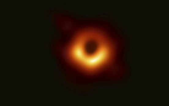 Astronomers unveil the first photo of a black hole