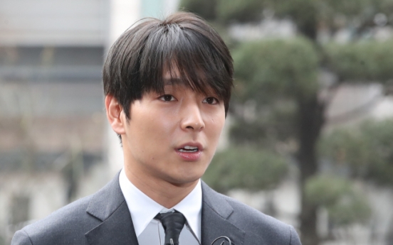 Ex-FT Island member files complaint against woman over alleged blackmail