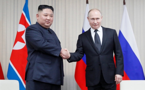 Kim, Putin vow to seek closer ties at first talks