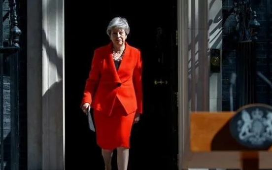 UK's May quits as party leader, starting succession race