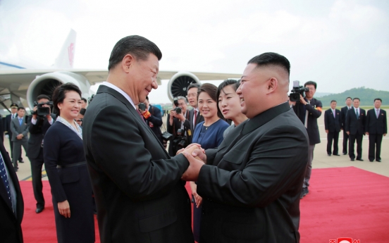 Kim, Xi agree to strengthen ties for regional peace, stability: KCNA