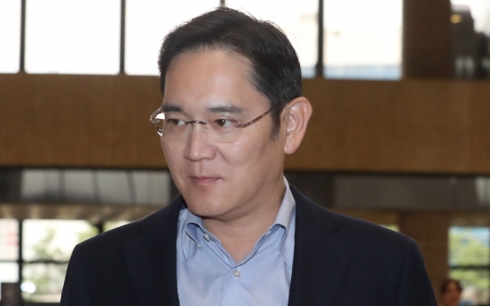 Samsung heir returns from Japan amid trade row