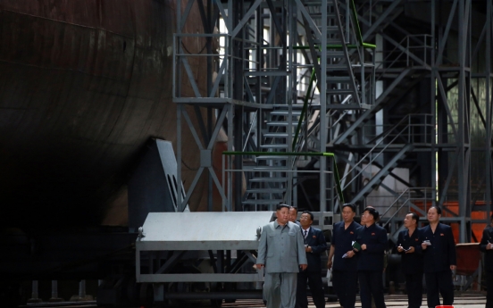 NK leader inspects new submarine to be deployed in East Sea: state media