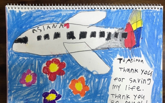 Asiana Airlines makes emergency landing to save 8-year-old passenger