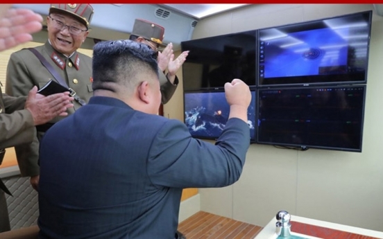 N. Korea says it tested 'new weapon' under leader Kim's guidance