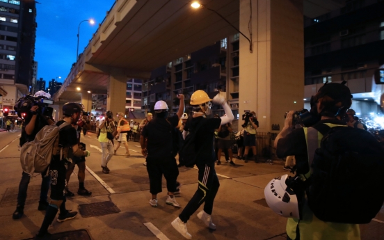 Defiant Hong Kong protesters vow huge rally despite Beijing threats