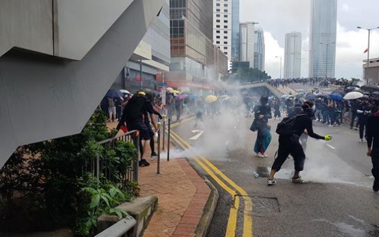 Fire, tear gas and petrol bombs as Hong Kong engulfed by chaos