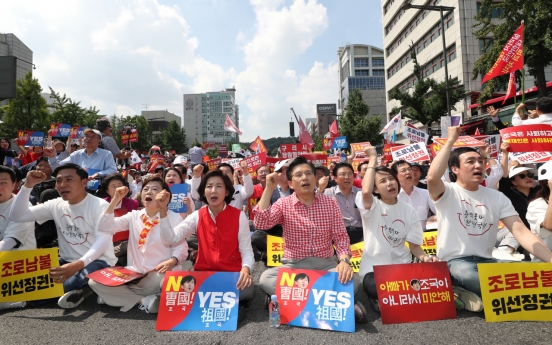 Main opposition party takes to the streets against justice nominee Cho
