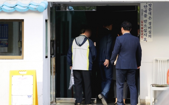 Prosecution raids justice minister's house over corruption scandal