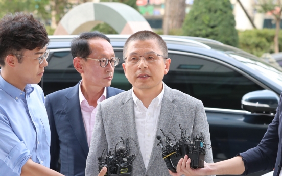 Opposition leader appears at prosecution office over 'fast-track' bills row