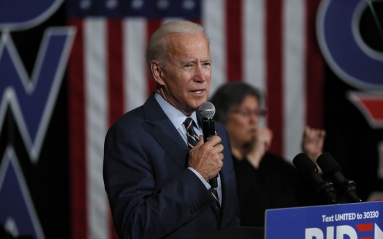 Biden says NK insults ‘badge of honor’