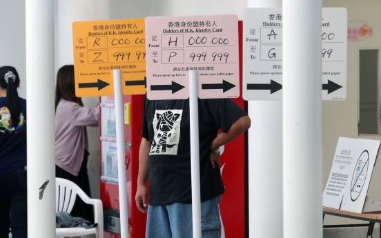 Hong Kong pro-democrats seek to hit government at district polls