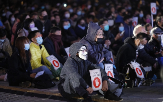 Hong Kong protesters aim for big turnout at rare sanctioned march