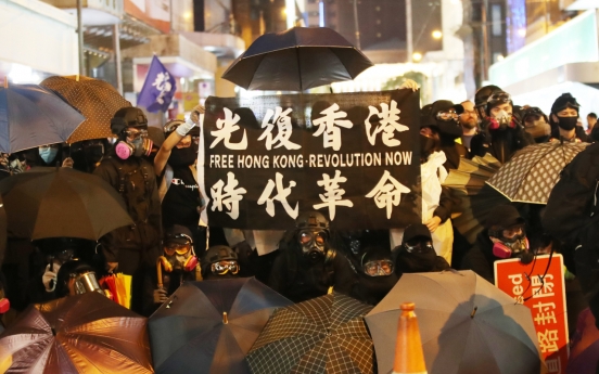 Hong Kongers mark half a year of protest with mammoth rally