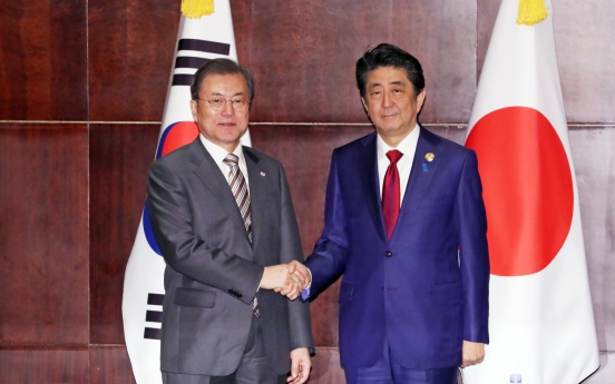 Seoul, Tokyo remain apart on forced labor issue, but stress dialogue at summit