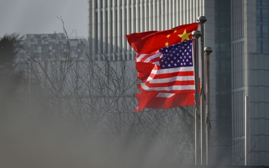 China revokes 3 Wall Street Journal reporters' credentials