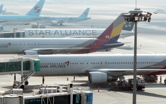 Asiana flight attendant infected with new coronavirus