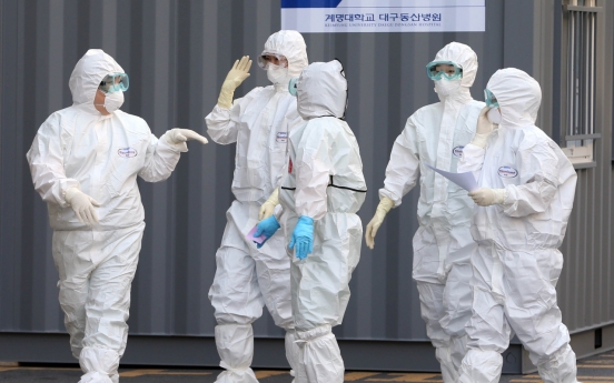 Korea sends military planes to secure more medical gowns amid anti-virus efforts