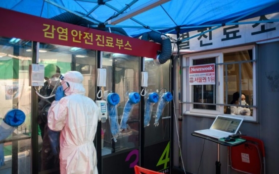 S. Korea dials up virus testing with hospital 'phone booths'