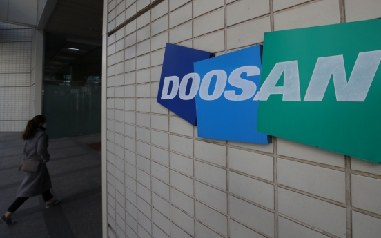 Doosan Group execs to forgo 30% of their wages