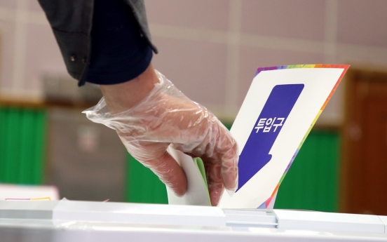 S. Koreans vote amid coronavirus outbreak with higher turnout than before