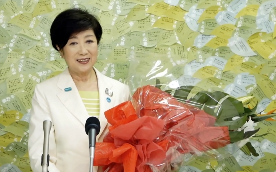 Tokyo governor wins 2nd term, buoyed by handling of virus