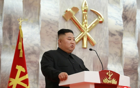 NK leader confers pistols to officers on armistice anniversary