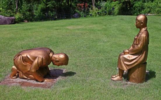 Kneeling man’s statue stirs controversy in Seoul, Tokyo