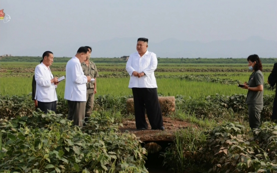 NK leader's reserve grain arrives at flood-hit village to help victims