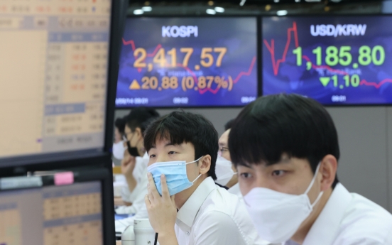 Seoul stocks open higher on tech gains, eased virus curbs