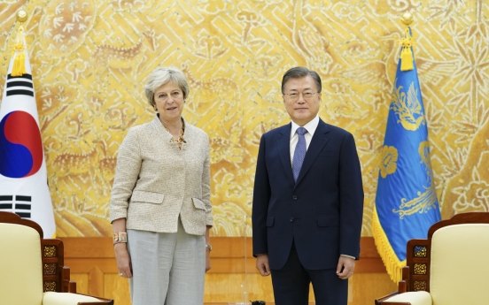 Moon meets ex-British prime minister, voices hope for closer Seoul-London ties