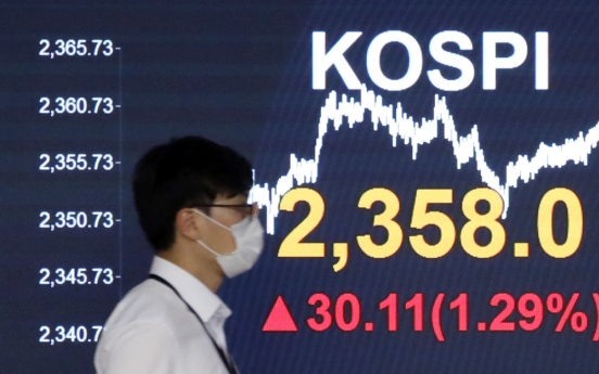 Seoul shares open higher on Wall Street gains