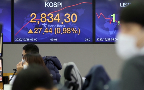 Seoul stocks open higher on chip gains