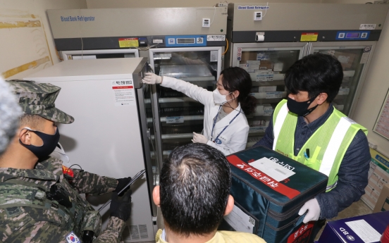 COVID-19 vaccines transported to Ulleung Island via military helicopter