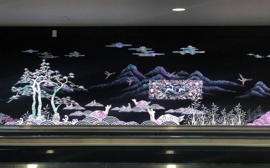 Media artwork with traditional Korean themes greet arrivals at Incheon Airport