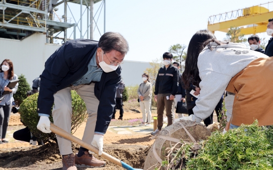 Moon attends tree-planting day event at historic power plant site