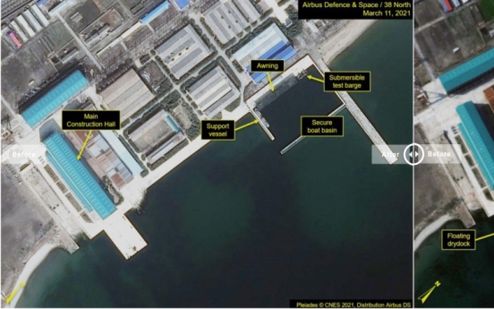 N. Korea may be modifying submersible missile test barge: 38 North