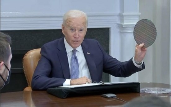 Biden pledges more investment in meeting over semiconductor shortage