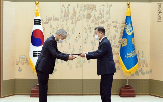 Moon presents new Supreme Court justice with letter of appointment