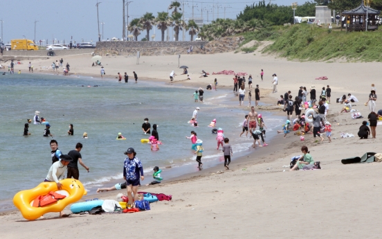 Congestion alert system to run at beaches amid eased social distancing