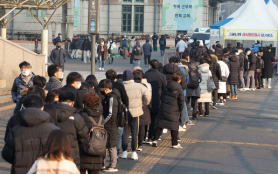 S. Korea's new COVID-19 cases over 50,000 for 2nd day amid raging omicron