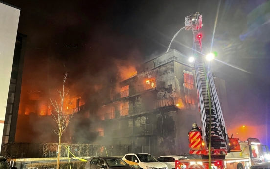 1 dead, 11 evacuated in apartment building fire