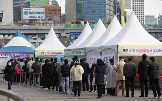 S. Korea's daily coronavirus cases spike to near 500,000; total caseload surpasses 10m