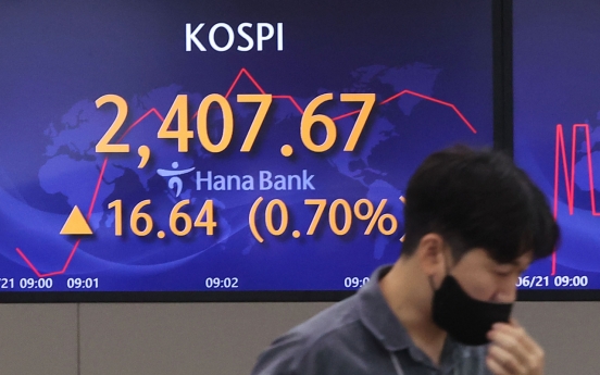 Seoul shares open slightly higher after Monday's rout