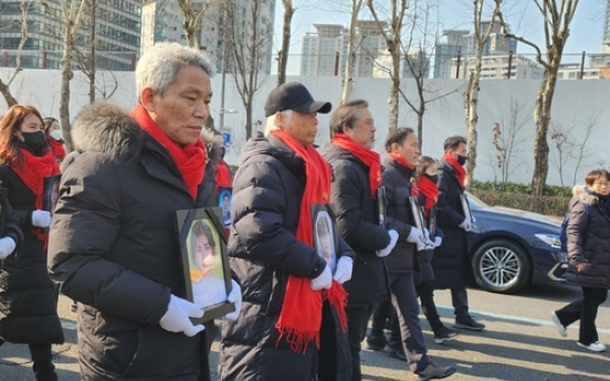 Families of crowd crush victims hold memorial rally in downtown Seoul