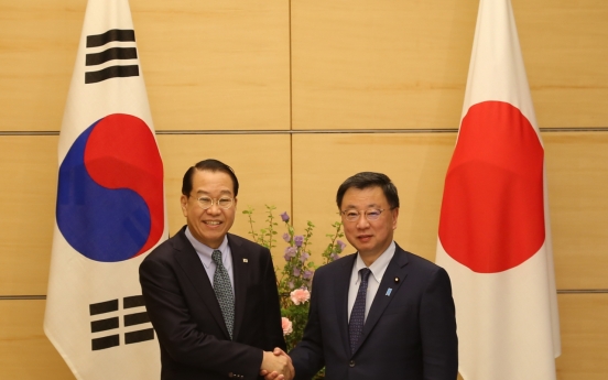 Unification minister meets top Japanese officials in Toky